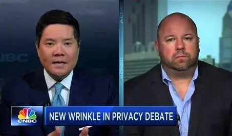 Split-screen CNBC still of an anchor and Ken Wisnefski with the banner New Wrinkle in Privacy Debate